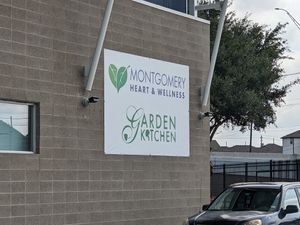 Outdoor signage at The Garden Kitchen in Houston