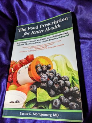 Dr. Montgomery's book; included recipes for some of the Garden Kitchen dishes. at The Garden Kitchen in Houston