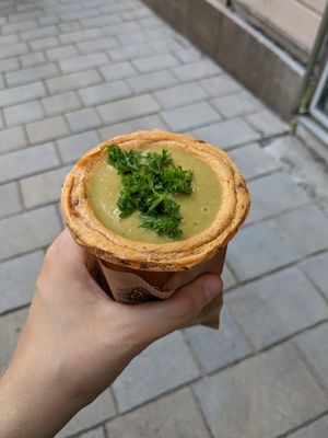 Broccoli soup in a tomato cup at Soup Culture in Bratislava