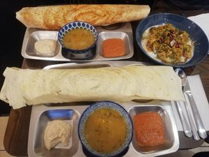 Bottom is vegan potato and veggies dosa. Upside two vegetarian Dishes at Dosa & Samosa in Bratislava