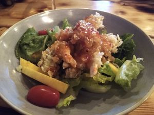 Vegan shrimp battered and on salad at Lôc Vegan in Mainz