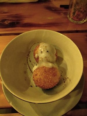 Sesame balls with coconut sauce (?) at Lôc Vegan in Mainz