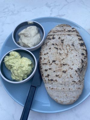 Bread with hummus and home made herb butter. at Rozey in Delft