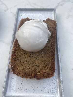 Lemon poppy cake with banana ice cream. at Rozey in Delft