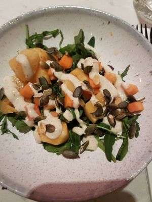 Salade van knolselderij
met rucola, pompoenpitten en truffeldressing at Rozey in Delft