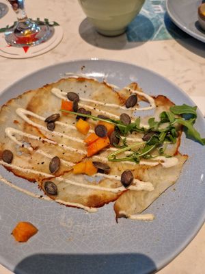 Carpaccio van knolselderij at Rozey in Delft