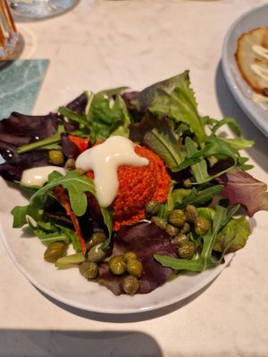 Steak tartaar
van bospeen, kappertjes, gerookte amandel en veganaise ￼ at Rozey in Delft