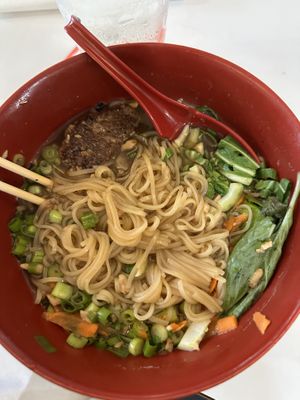 Impossible rice noodle bowl (partially eaten)   at 86 Forks Bar + Table in Pensacola