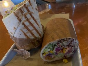 Vegan wrap with paper removed to show bread at Spitz in Portland