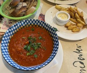 Vegan tomato soup + bread + rosemary fries with non vegan mayo🥲  at Villa Augustus in Dordrecht