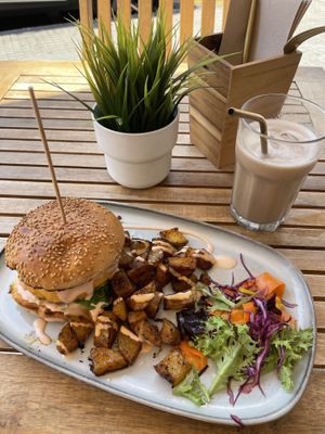 Plant based “meat” burger + iced chai latte with oat milk  at Ahimsa in Mallorca