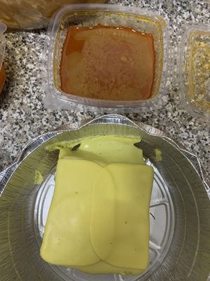 Sauce comes on the side at Francesinha em Casa in Portimao