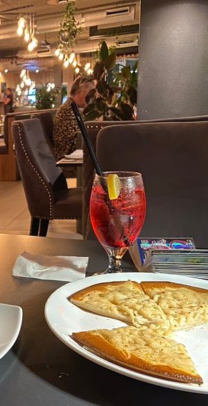 Garlic cheesy (vegan GF) pizza   at Amici Restaurant Pizzeria in Caloundra