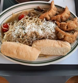 Spaghetti aglio e olio with sliced Mozzarella cheese and fried dumplings at Breaghetti Itaewon in Seoul