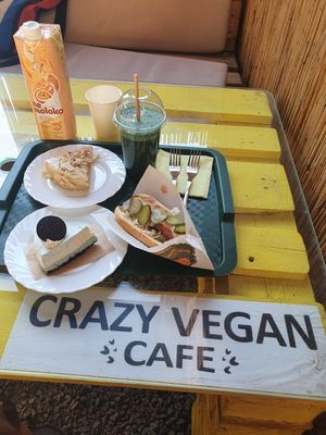 Hot dog, oreo cake and Napoleon cake at Veggie Bar in Minsk