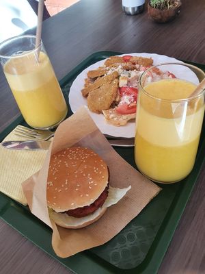 Cesar salad and "beef" burger at Veggie Bar in Minsk