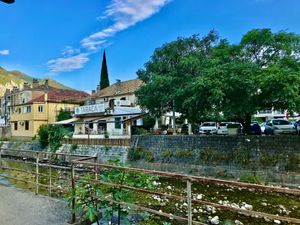 The view of the restaurant from across the water. at Resto Bar Taraca in Kotor