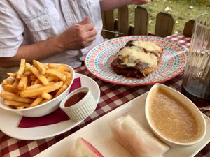Fries and Vegetarian Lasagna at Resto Bar Taraca in Kotor