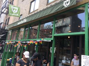 Front of restaurant. Note the pride flags: though *not* a gay venue (it is open to all types of folks), this place does seem to have a large gay clientele. at Westville - Hell's Kitchen in New York City