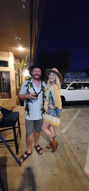 Enjoying a kava shell in the outdoor seating  at Aumākua Kava Lounge in Paia