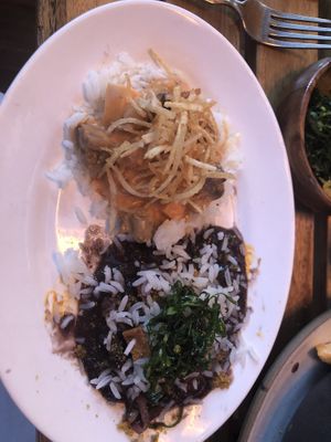 Strogonoff on the left and feijoada on the right   at Berimbau Brazilian Kitchen in New York City