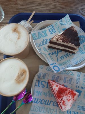 Cappuccino con leche de soya y los deliciosos  postes 😍 at Cala Vegana in Menorca