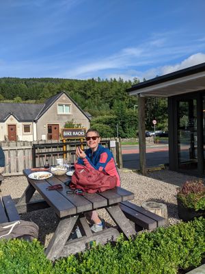 Sunny Scotland and roadside seating at The Real Food Cafe in Tyndrum