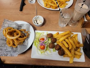 Vegan Onion Rings, Vegan Garlic Mayo, Falafel and Chips, Tap Water and Vegan Chocolate Milkshake at Barnacles in Llandudno