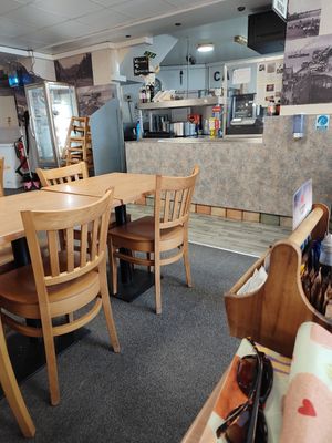 Indoor seating at Barnacles in Llandudno