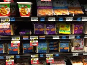 Different cheeses in grocery store at Mustard Seed Market - Montrose in Akron
