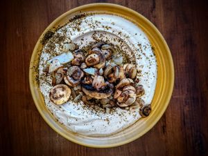 Hummus with sauteed mushrooms and onions at TLV in Marietta
