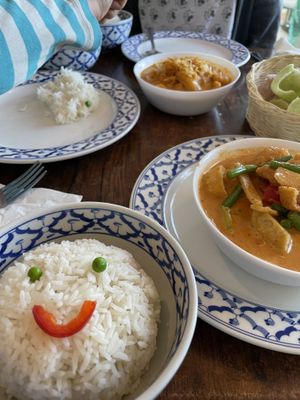Smiling rice; massaman and red curries  at Largigi Thai in Lyme Regis