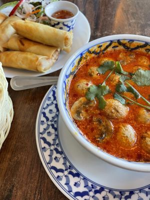 Spring rolls and mushroom Tom Yum soup  at Largigi Thai in Lyme Regis