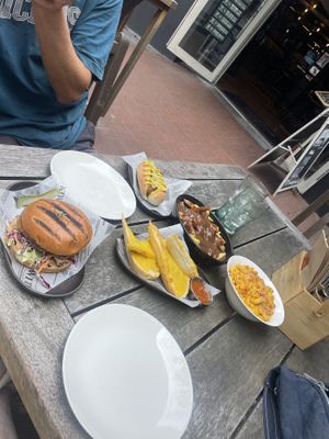 Not chicken burger, garlic bread, poutine, and hotdog   at The Locker Room in Queenstown