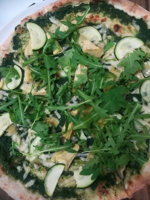 Spinach-base green pizza at GreenGorilla in Budapest