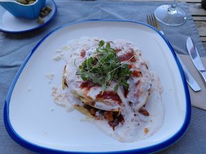 Vegan enchiladas with optional spicy sauce at La Hormiga in Pontevedra