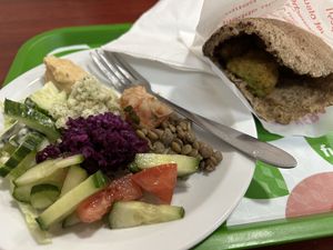 You make a plate with whatever you want from the salad bar, and get your hot falafels, all for 8€  at Mr Falafel - Lemonnier in Brussels