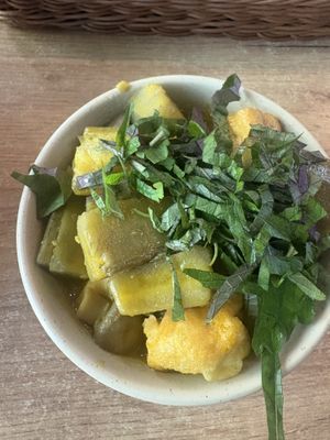 Small bowl tofu and plantain  at La Vegana in Warsaw