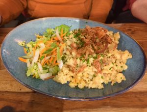 Seasonal dish: Cheese spaetzle with fried onions and salad (April 2024)  at Pfannenzauber in Aachen