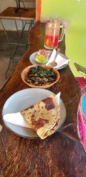 Chapati. Mchicha. Black beans. Salsa. Guac. Mango Beetroot Smoothie. at Vegan Basket in Kilifi