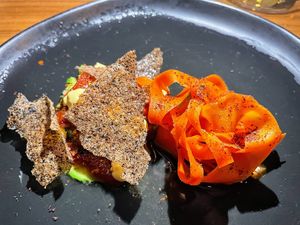 Watermelon Crudo
Sandia-fermented carrot-wild rice  at MITA in Washington