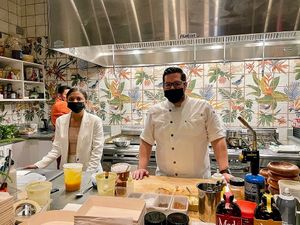 Chef and waitress  at MITA in Washington