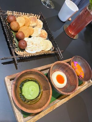 Arepas of plantain, potato, yucca, corn, and wheat, with avocado and sour cream spreads and fruit butter.  at MITA in Washington