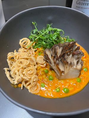 Charred banana, pearled barley, maitake mushroom, and peas.  at MITA in Washington