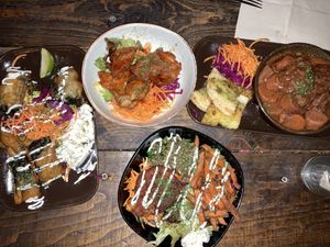 From top clockwise: alternative to chicken wings (starter), bluff bourgingnon (main) Angela’s green bowl (main) and nori crispy batter thing with tartare sauce (starter)   at Moon and Sons in Caen