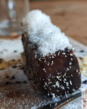 The “Moonie” dessert is a bounty-style bar with a melting vanilla cream topped with pure cocoa icing. at Moon and Sons in Caen