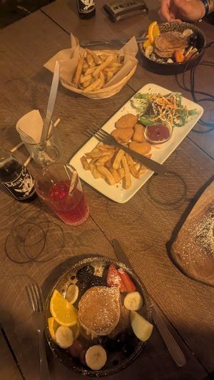 Pancakes, side portion of fries and the kids vegan "chicken" nuggets and chips  at Moon and Sons in Caen