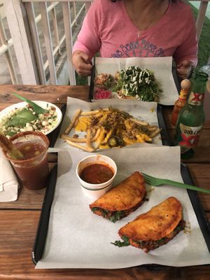 Quesabirria Tacos, Fancy Fries, Jackfruit Flauta, I Heart Ceviche with a side of Michelada!  at Plantology - Cloud Kitchen - Maybe closed in San Antonio