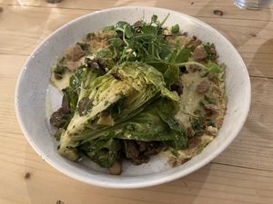 Leek and mushroom ragu on herby polenta   at The Blonde Beet in Stamford