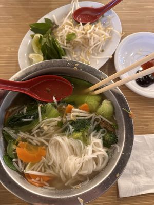 Rice noodle soup w side veggies   at Quang Restaurant in Minneapolis